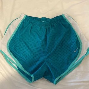 Blue Nike shorts with lining attached